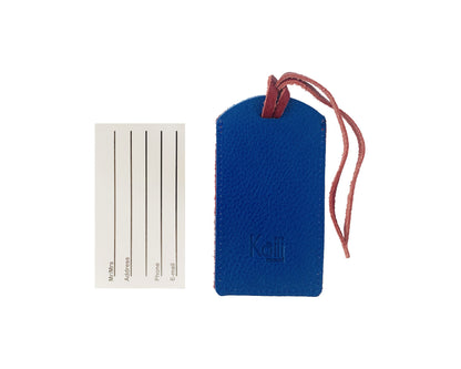 K0041VDB | Two-tone luggage tag Made in Italy in genuine full-grain leather, dollar grain - Red/Blue color - Dimensions: 6.5 x 12 cm - Packaging: Rigid bottom/lid gift box