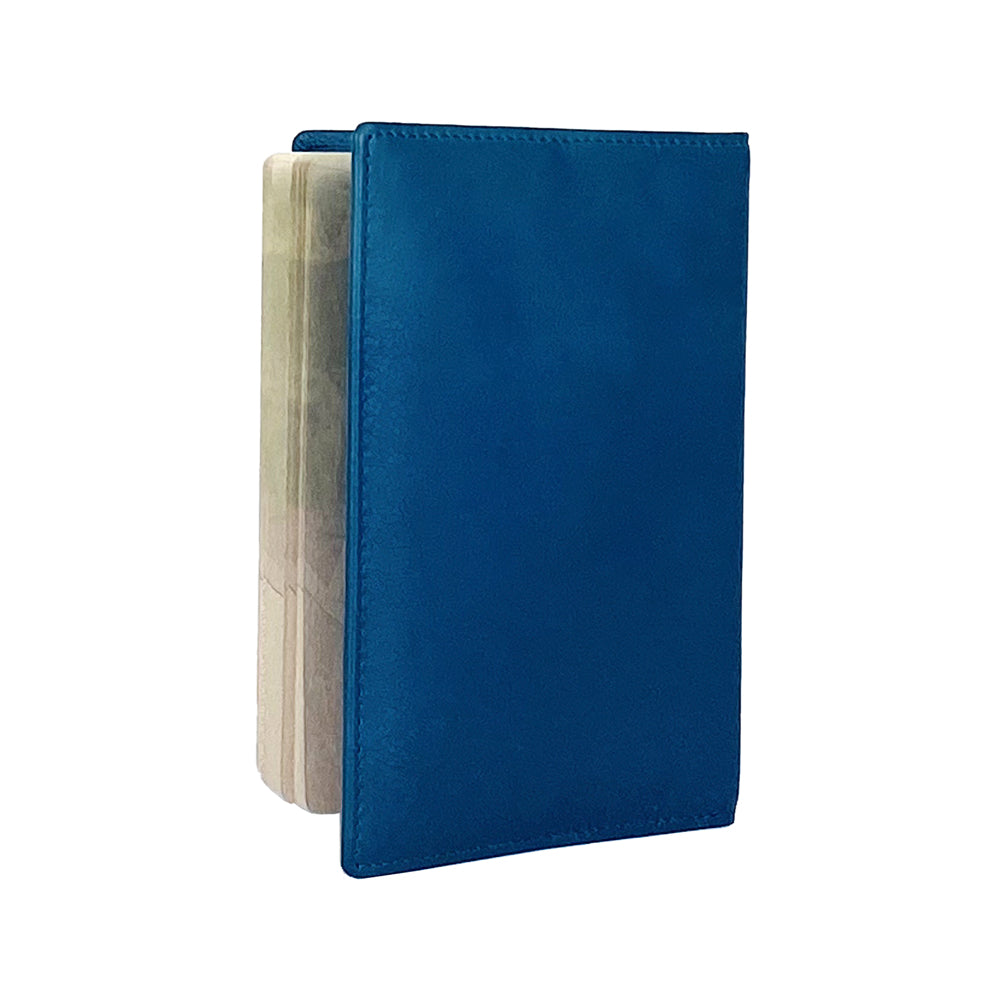 K10237MB | Passport Cover in Genuine Full Grain Leather, with light grain. Color Blue Jeans. Dimensions when closed: 10 x 14 x 1 cm - Packaging: Rigid bottom/lid gift box