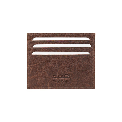 K10616BB | Credit Card Holder in genuine full grain leather, milled. Color dark brown. Large central pocket. Dimensions: 9.8 x 8 x 0.5 cm. Packaging: Rigid bottom/lid gift box