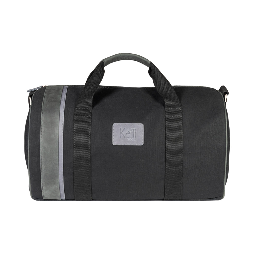 K0024AB | Travel bag in Canvas/Genuine Leather, full grain, flywheel - Black colour. Accessories in antiqued nickel, zip closure. Dimensions: 48 x 31 x 22 cm - Packaging: TNT bag