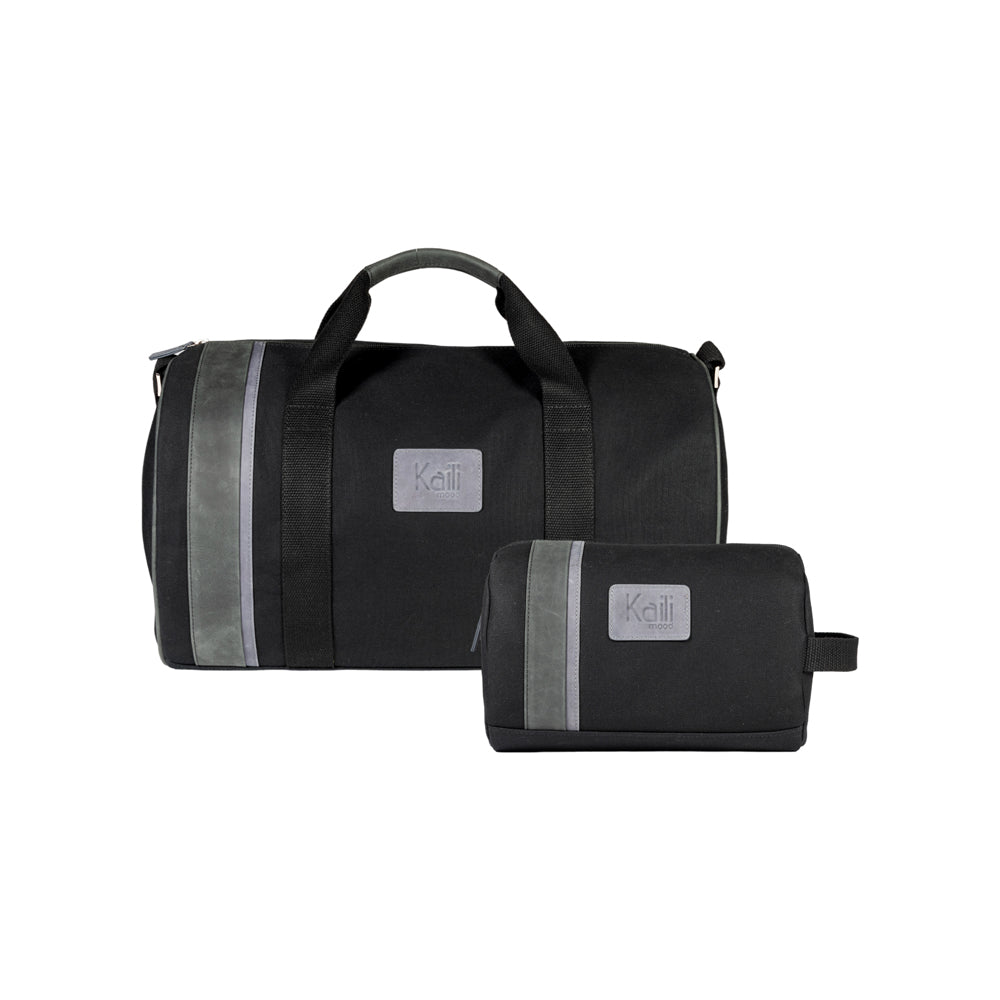 K0024AB | Travel bag in Canvas/Genuine Leather, full grain, flywheel - Black colour. Accessories in antiqued nickel, zip closure. Dimensions: 48 x 31 x 22 cm - Packaging: TNT bag