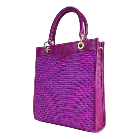 RB1026CN | Vertical women's handbag in genuine leather and straw Made in Italy. Removable and adjustable leather shoulder strap. Polished Gold Accessories - Raspberry Color - Dimensions: 24 x 29 x 9 cm