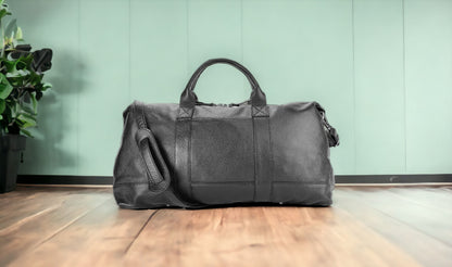 RB1029A | Borsone da Viaggio in Vera Pelle Made in Italy con Tracolla regolabile e removibile. Chiusura con lampo e Accessori in metallo Nickel Lucido - Colore Nero - Dimensioni: cm 57 x 26 x 24