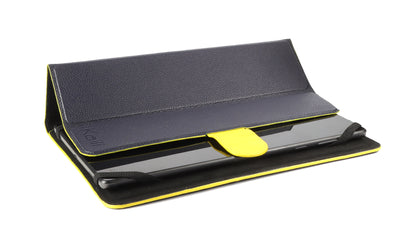 K0033DB | Genuine Leather Tablet Case, full grain, dollar grain. Col.Blue with Yellow edges. Contrasting tab closure. Dimensions: 19.5 x 25.2 x 1 cm. Packaging: TNT bag