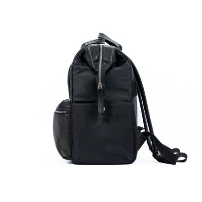 K0037AB | Water-repellent backpack in Waterproof Nylon/Genuine full-grain leather with light grain - Black color - Polished nickel accessories. Dimensions: 27 x 39 x 19 cm - Packaging: TNT bag