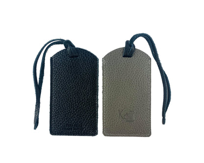 K0041AFB | Two-tone luggage tag Made in Italy in genuine full-grain leather, dollar grain - Black/Grey color - Dimensions: 6.5 x 12 cm - Packaging: Rigid bottom/lid gift box