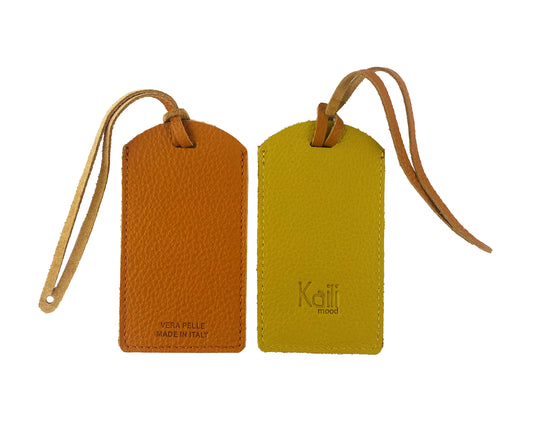 K0041LRB | Two-tone luggage tag Made in Italy in genuine full-grain leather, dollar grain - Orange/Yellow color - Dimensions: 6.5 x 12 cm - Packaging: Rigid bottom/lid gift box